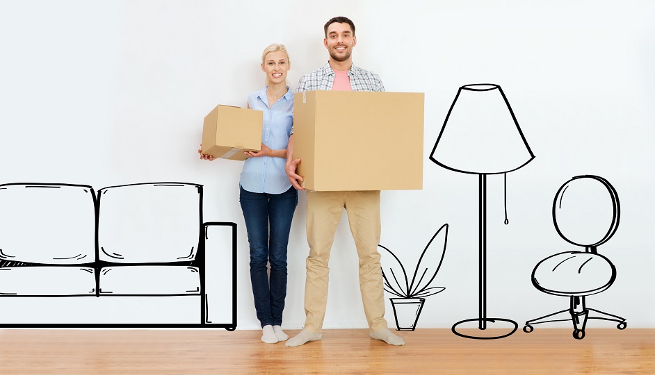 couple with cardboard boxes moving to new home