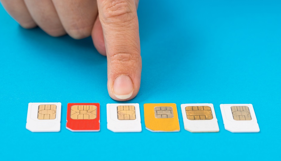 Person Hand Selecting Sim Card