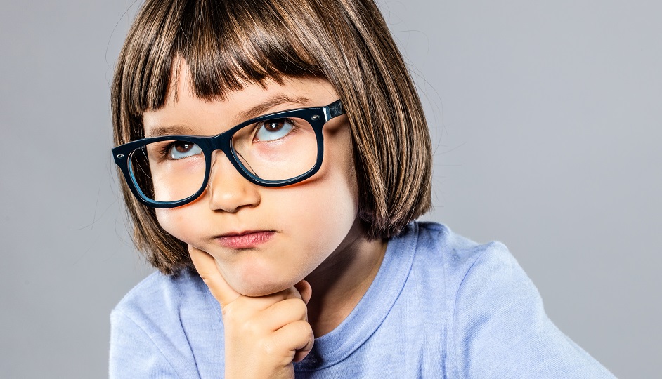 beautiful kid playing Thinker with serious eyeglasses for intelligent solution